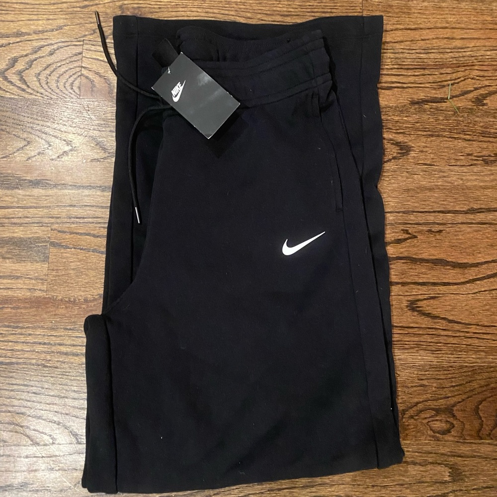 Women’s medium Nike sweatpants. Black. New with tags. Too long for me to wear.
